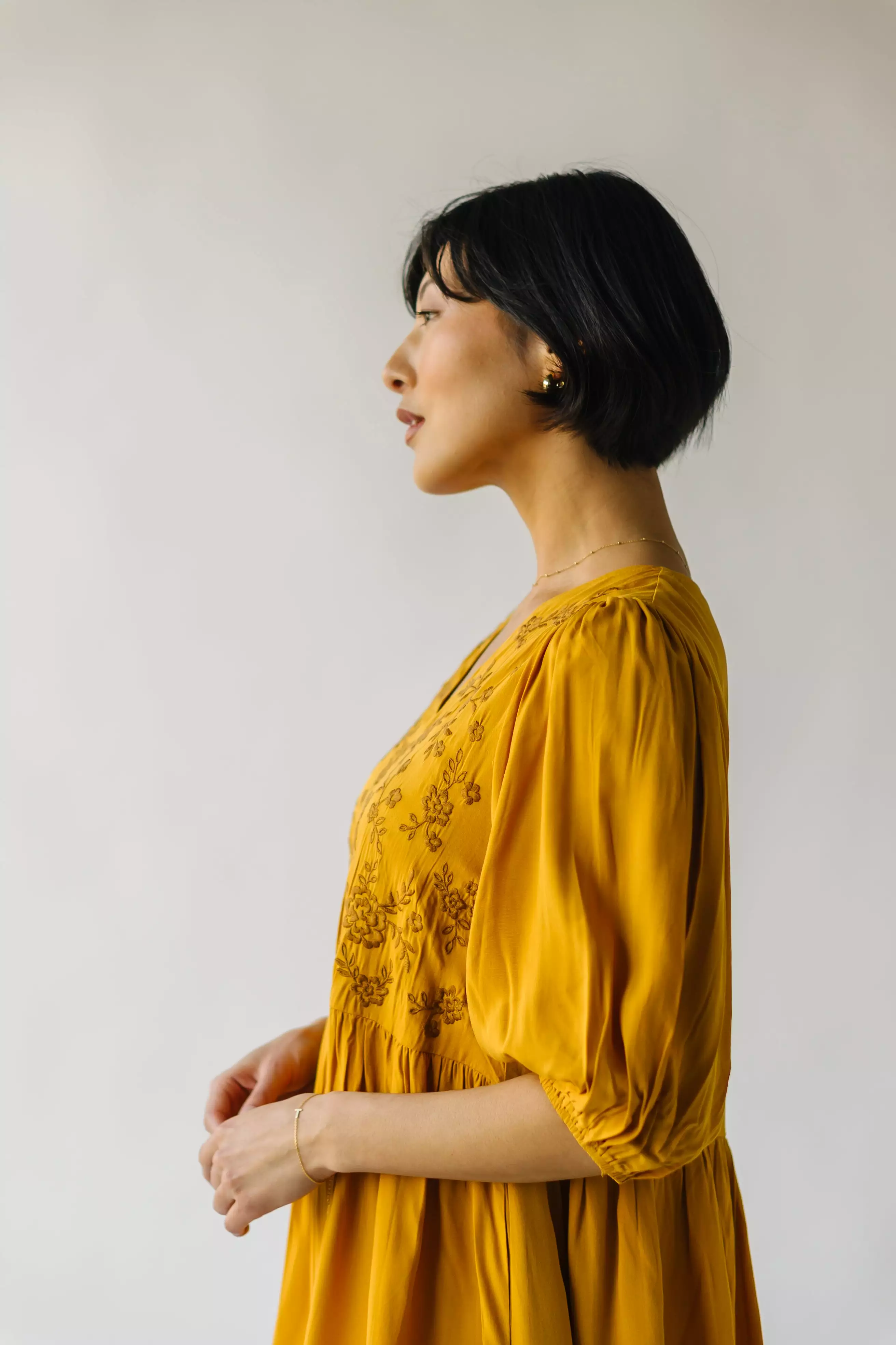 The Delaina Embroidered Floral Dress in Dark Mustard