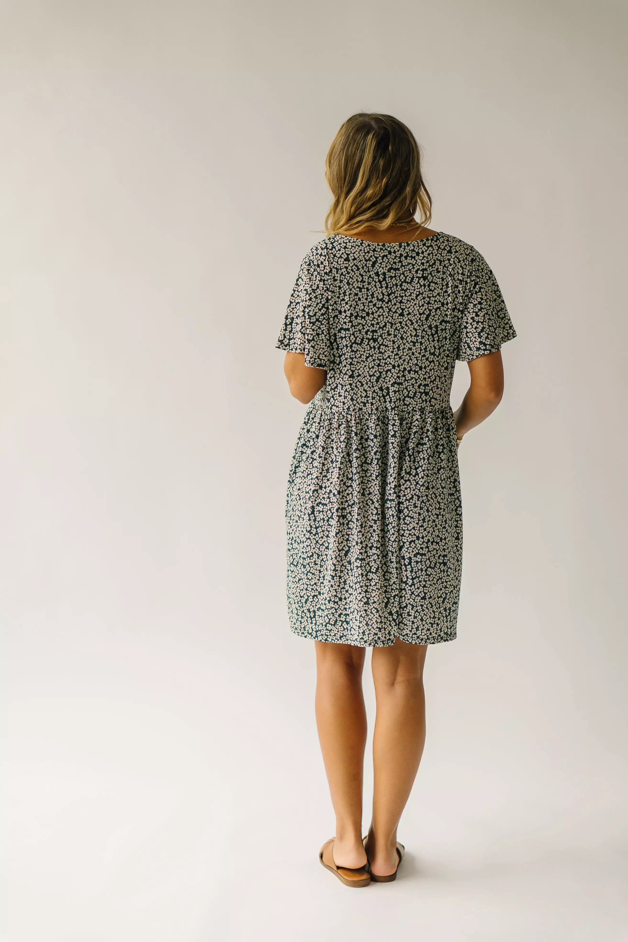 The Egan Flutter Sleeve Floral Dress in Hunter Green